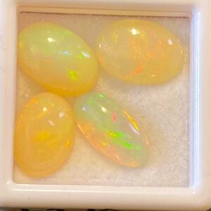 Opals, 100% natural. Lot of (4) 12.10ct Tw Natural Australian solid opals.$$$$$$